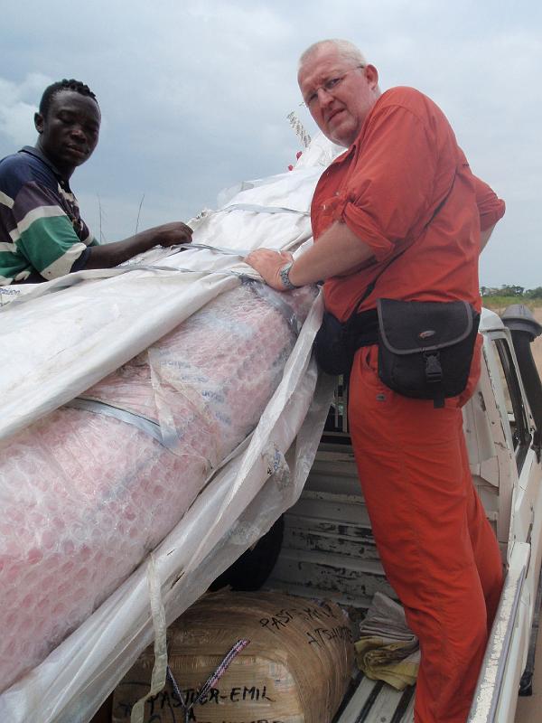 Keeping the kayak stable on dirth road on top of jeep.jpg
